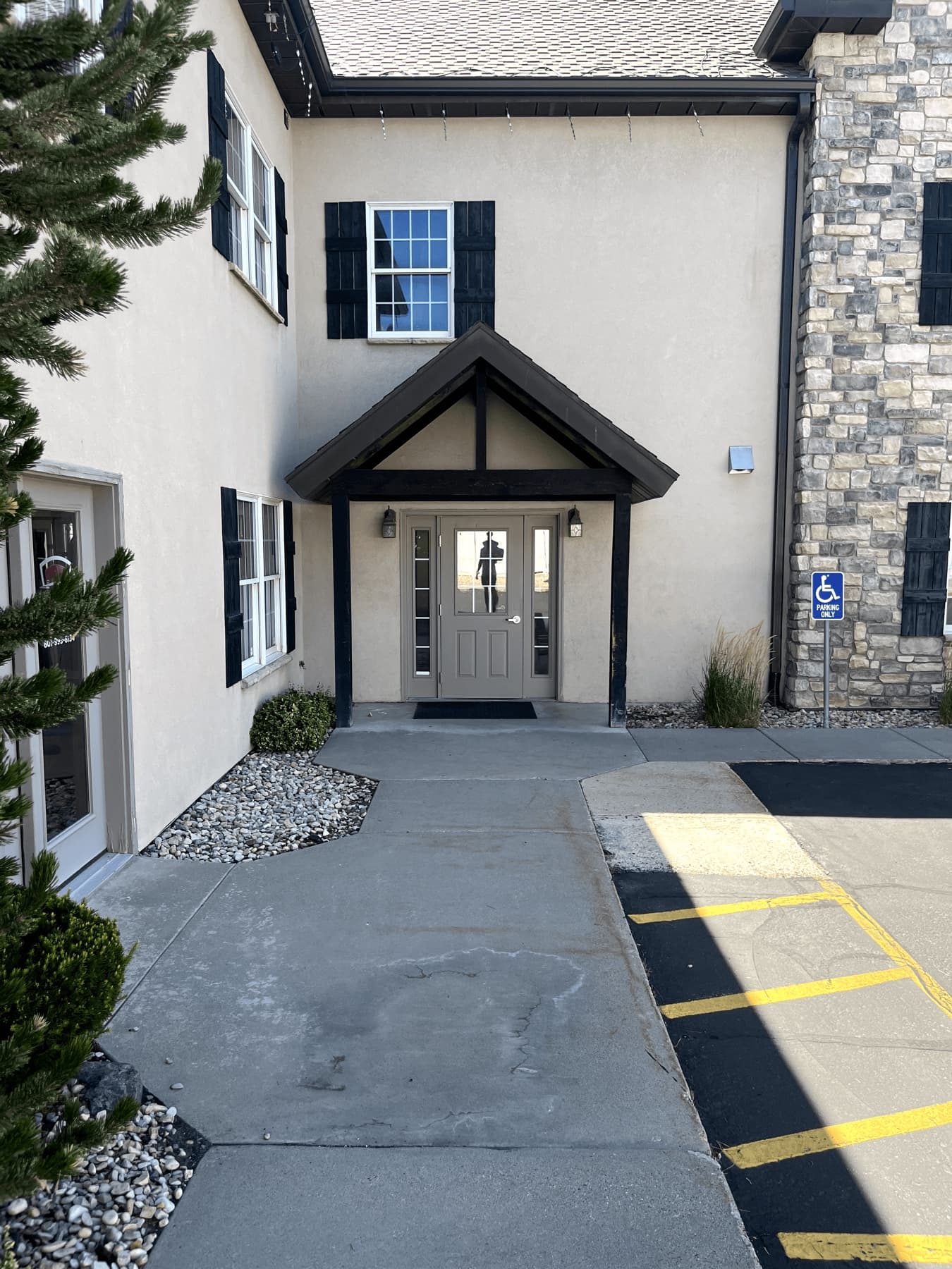 Back entrance door to enter for Sansom Dental